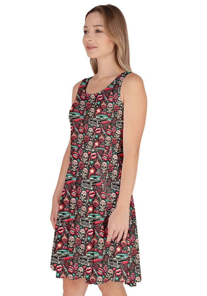 Rebel Rose knee-length skater dress featuring a bold rockabilly print of skulls and hotrods, stylish and practical with pockets.