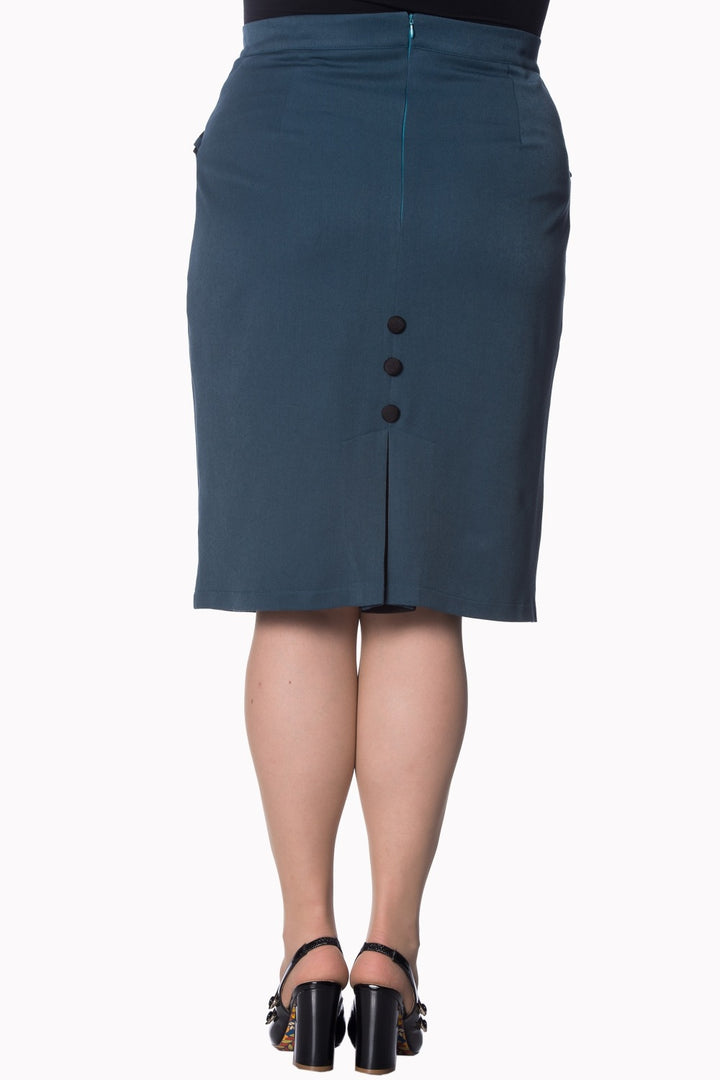 Back view of Classic Plus Size Tori Pencil Skirt featuring button detail and side pockets, styled with heels.