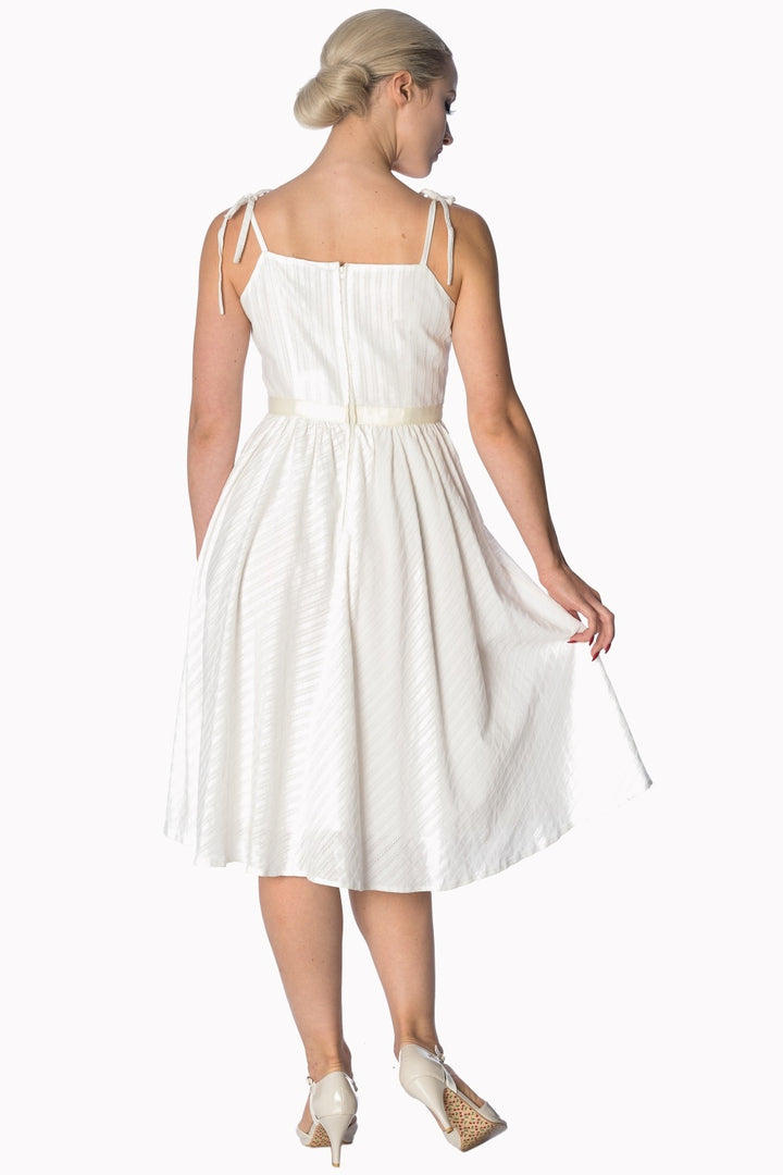 Back view of the Make A Wish Strappy Sundress, a stylish white dress featuring adjustable straps and a flattering silhouette.