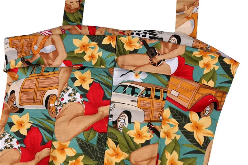 Vibrant Tropical Pinups Halter Top featuring pinup girls and woody cars on a floral background.