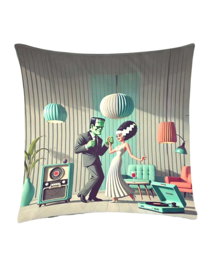 Ghouls A-Go-Go throw pillow cover featuring Frankenstein and his Bride dancing in a retro lounge with colorful décor.