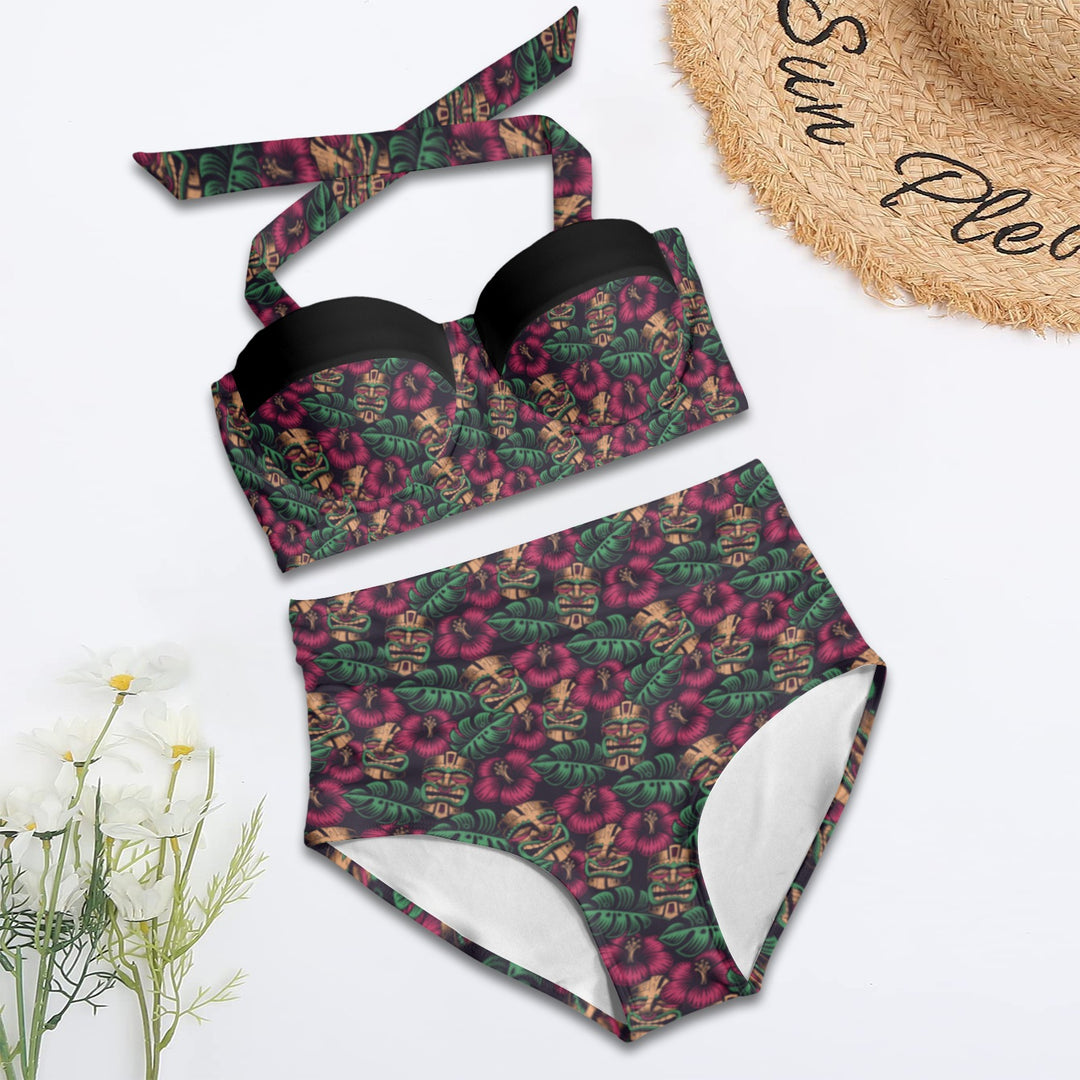 Leilani Tiki Retro High Waist Bikini with vibrant tiki print and underwire support, complemented by a straw sun hat.