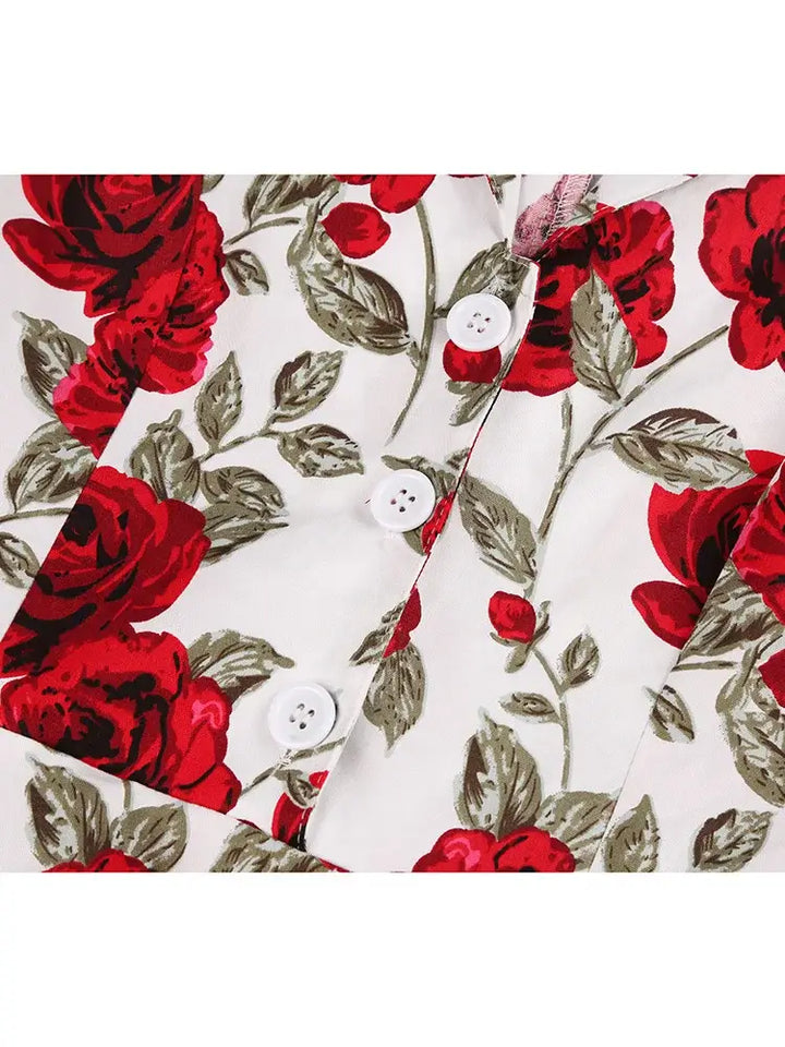 Close-up of red rose print fabric with buttons, perfect for the Rose Romance Vintage Swing Dress design.