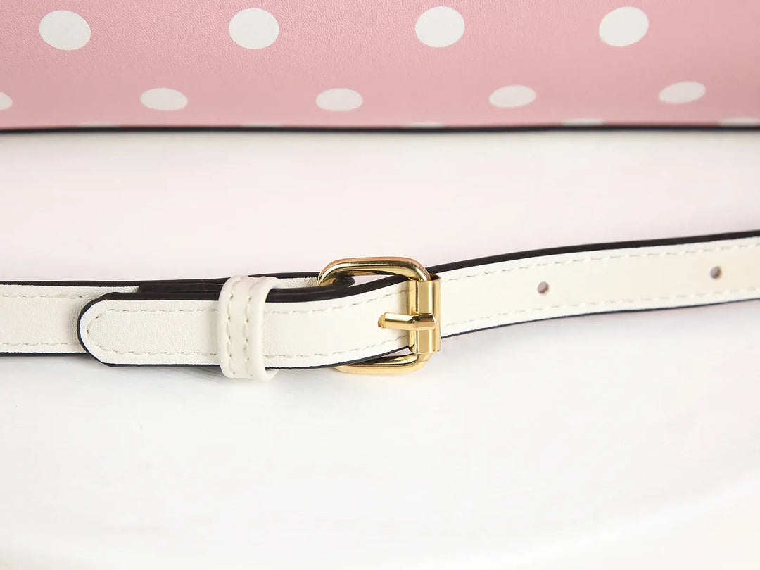 Close-up of the white adjustable strap with gold buckle on Pink Polka Dot Rockabilly Handbag.