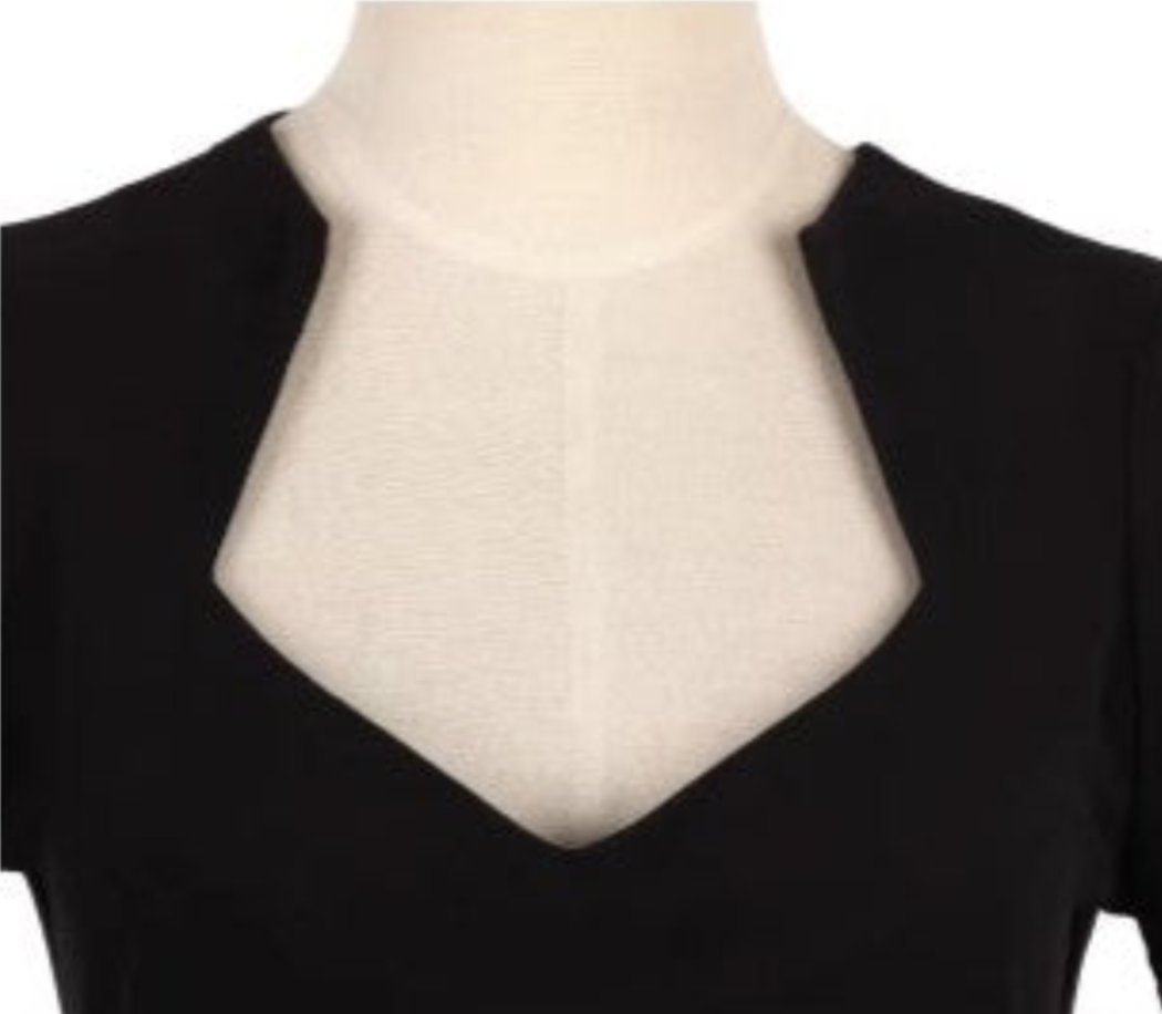 close-up of the Bridget retro top in black showcasing its elegant neckline design and classic style.