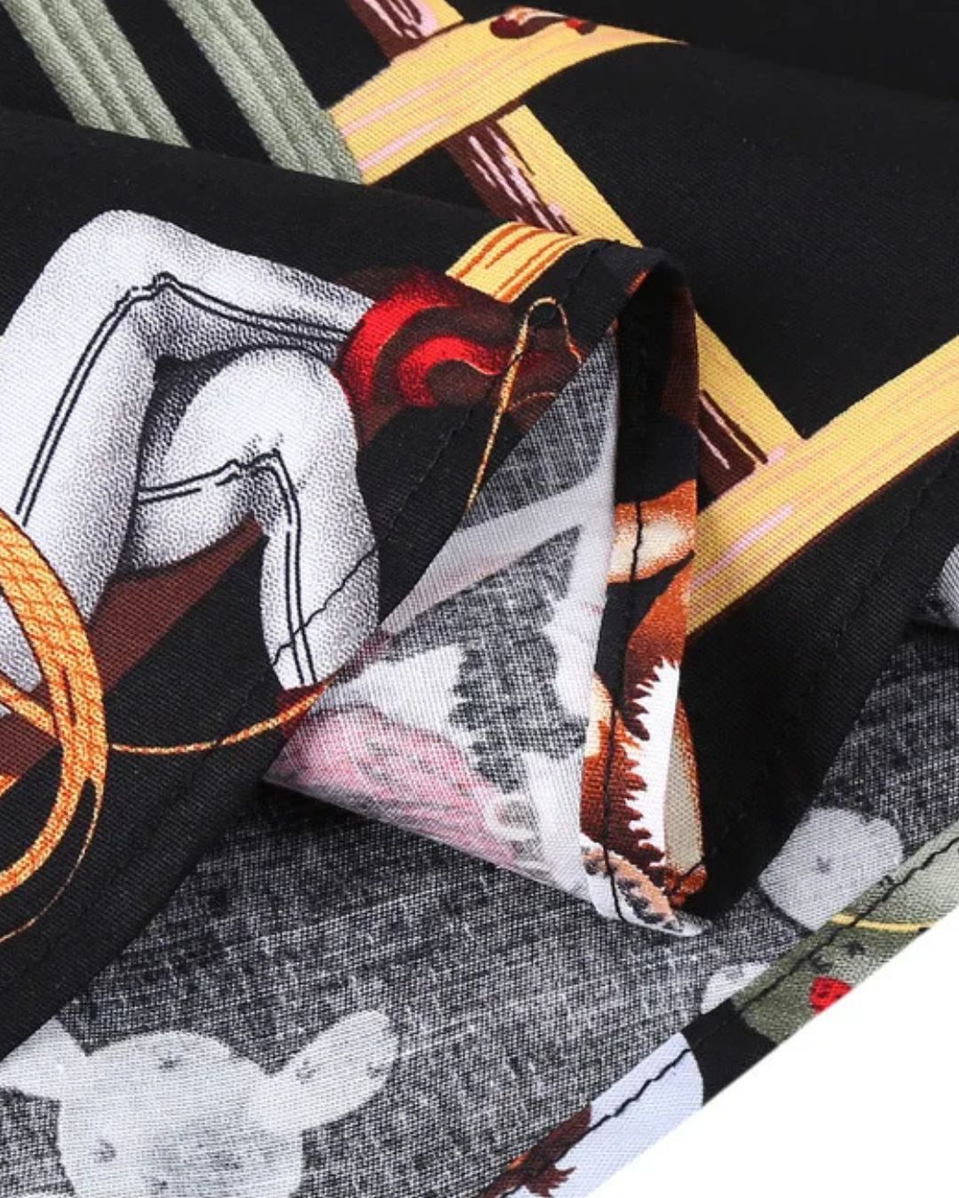 Close-up view of Black Western Cowgirl Swing Dress fabric featuring bold vintage-inspired cowgirl print.