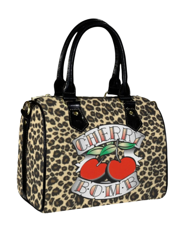 Cherry Bomb Handbag in leopard print with cherry graphic, perfect for bold vintage-inspired style and everyday elegance.