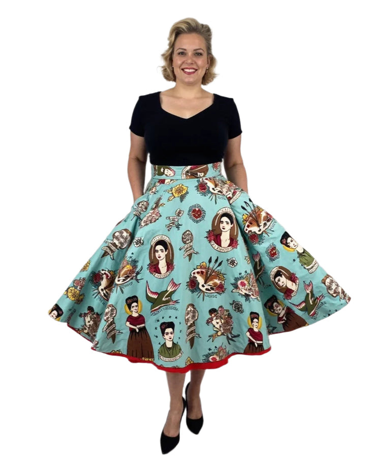 Woman wearing Frida Cotton Full Circle Skirt featuring vibrant Frida Kahlo prints, perfect for an artistic and elegant look.