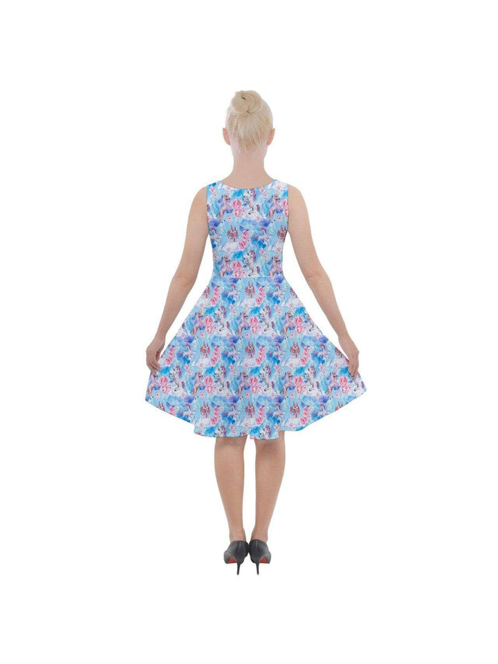 Back view of a knee-length skater dress in blue unicorn watercolour print, featuring a fit and flare design.