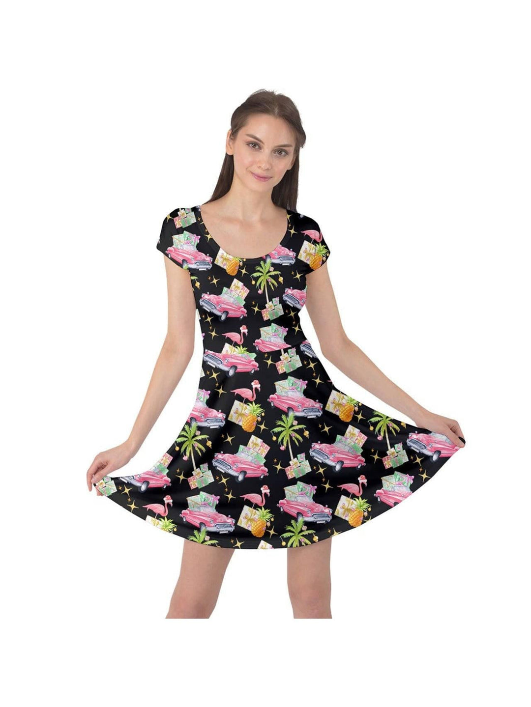 Tropical Christmas cap sleeve dress with flamingos, classic cars, and pineapples in vibrant colors. Perfect for holiday parties.