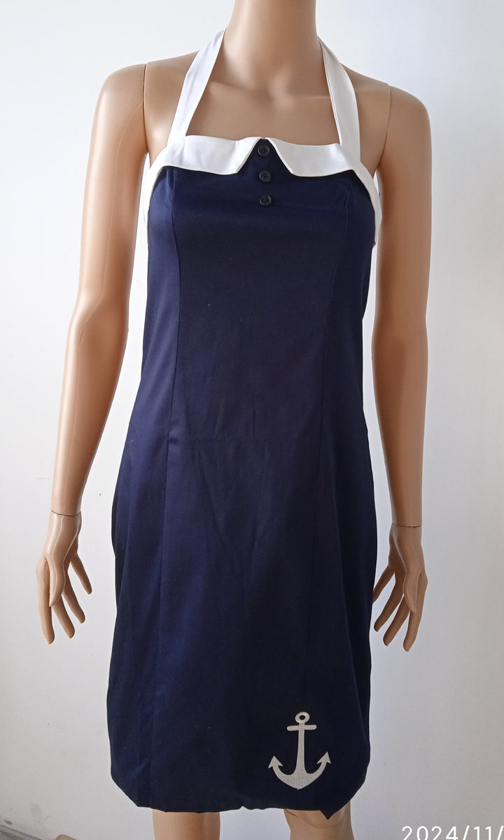 Navy nautical pencil dress with white collar and anchor embellishment, perfect for stylish, vintage-inspired occasions.